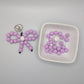 Purple and white beaded bow kit